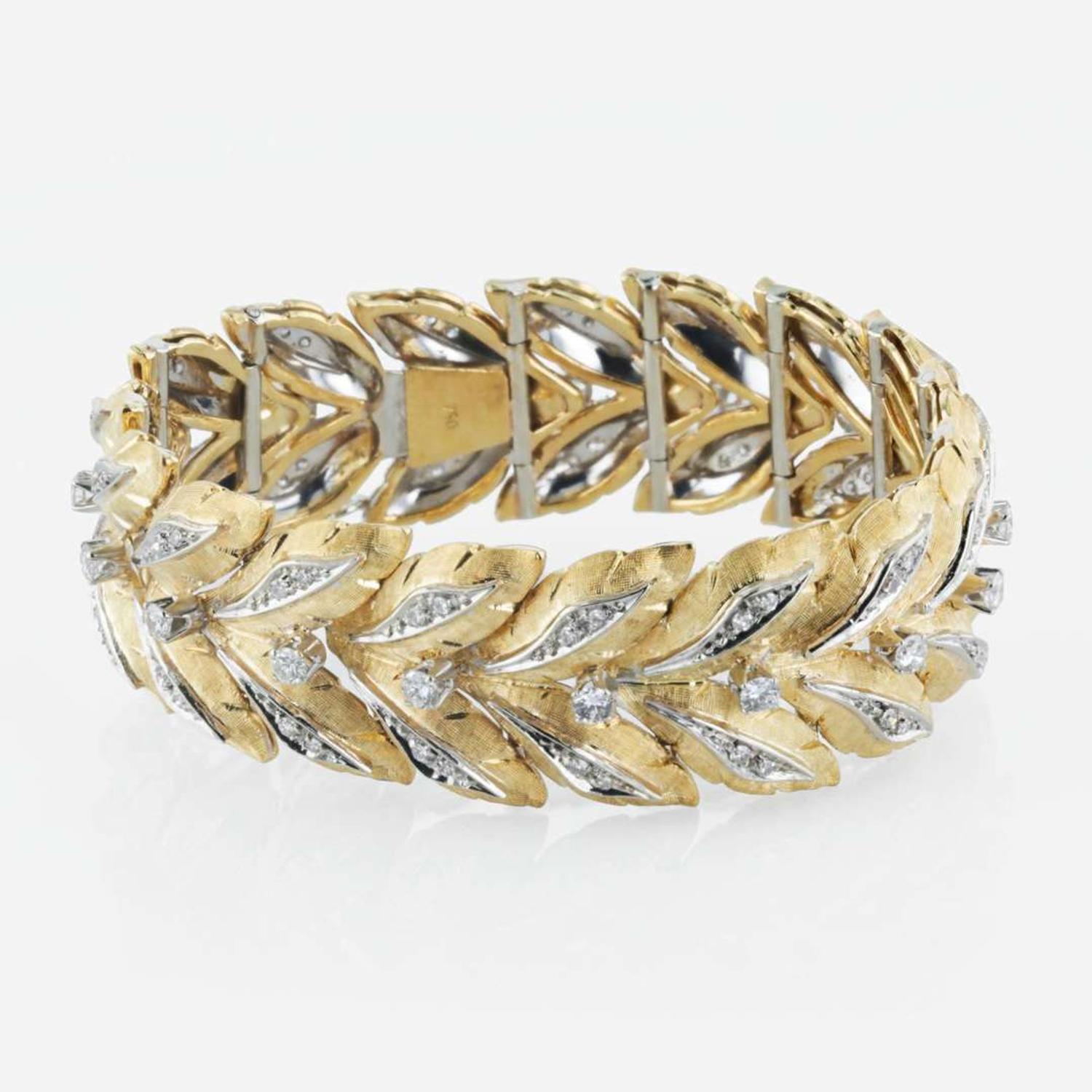 An 18K bicolor gold and diamond link bracelet