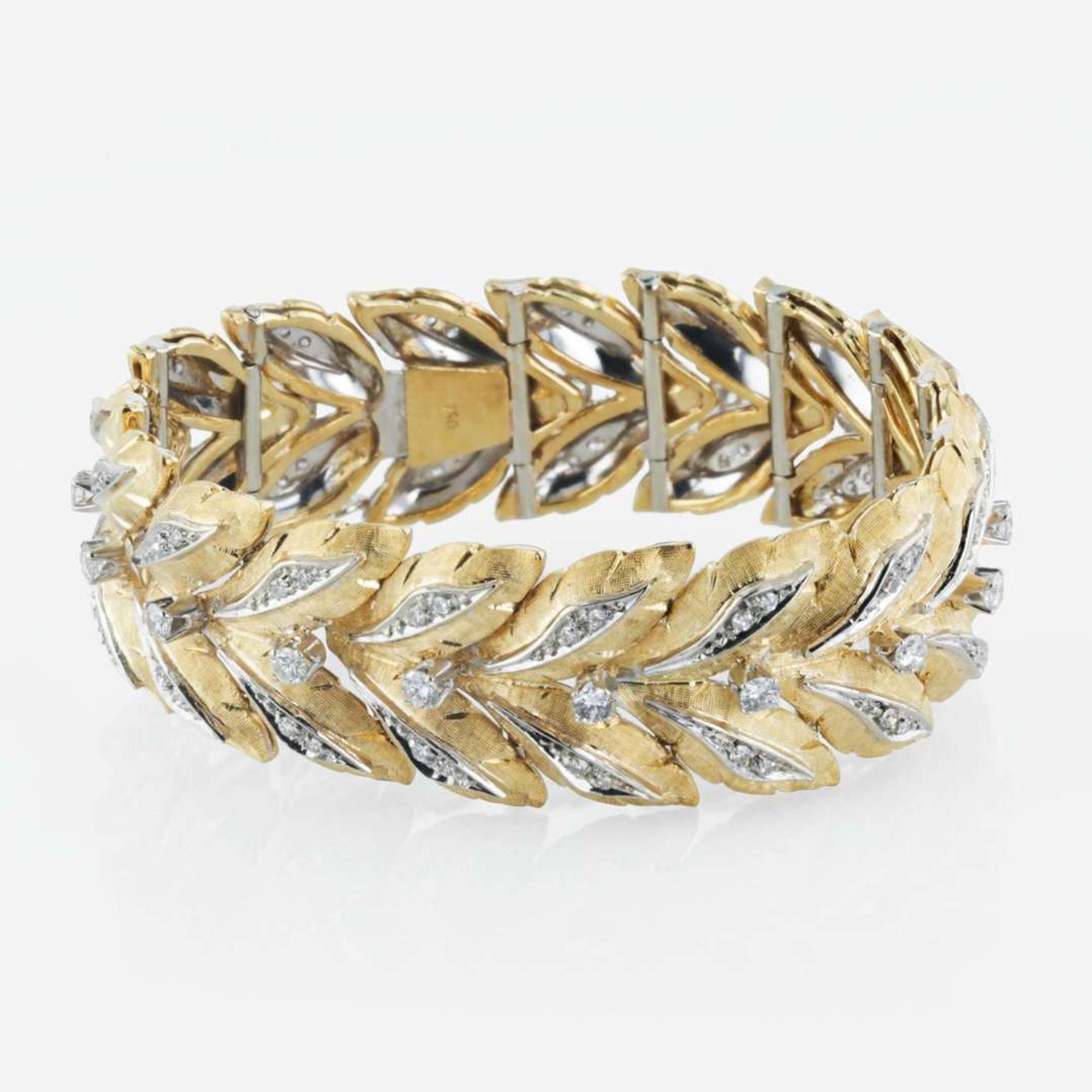 An 18K bicolor gold and diamond link bracelet