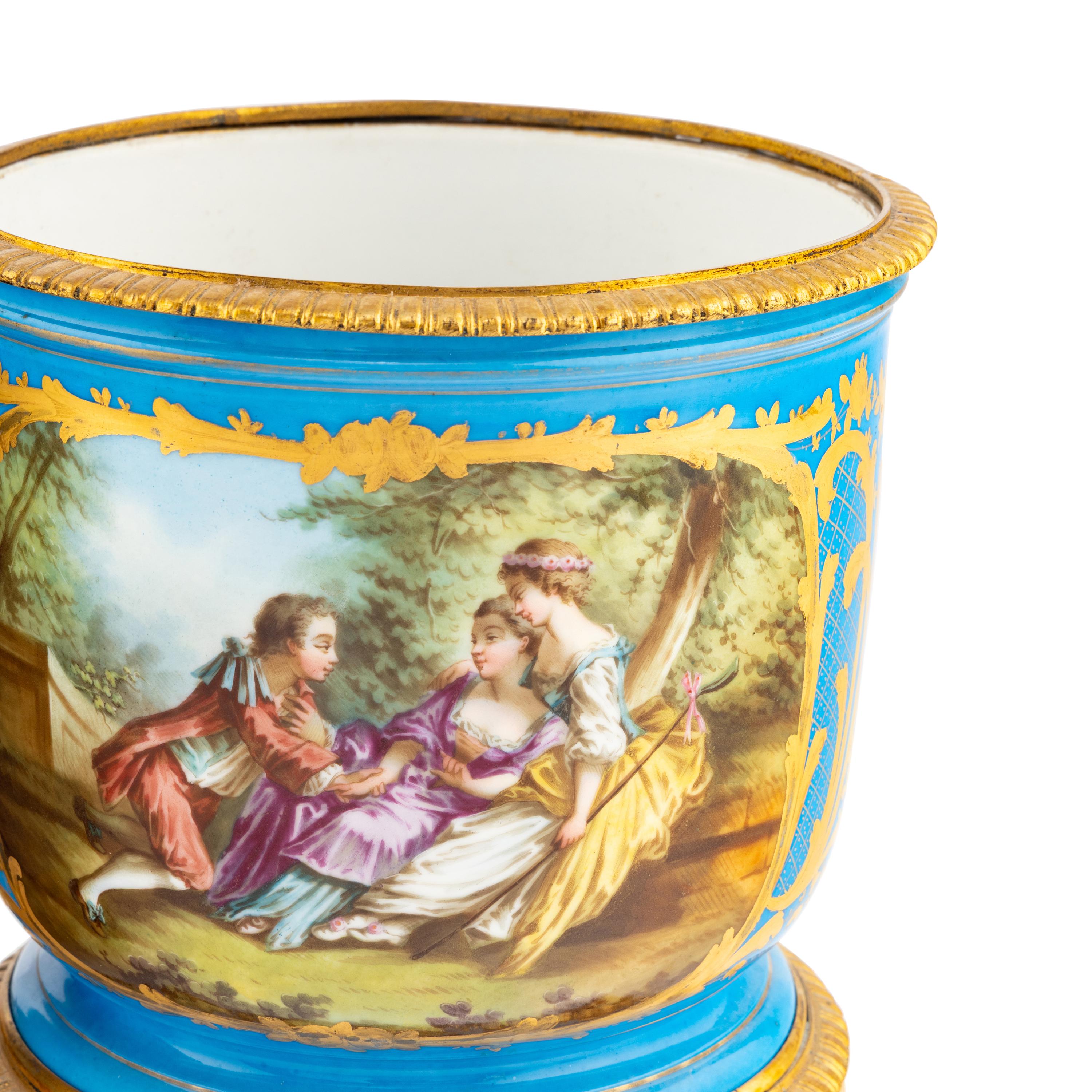 A Pair of Sèvres Style Porcelain and Gilt Bronze Mounted Cache Pots