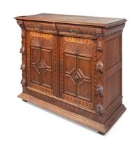 A Renaissance Revival Carved Oak Cabinet