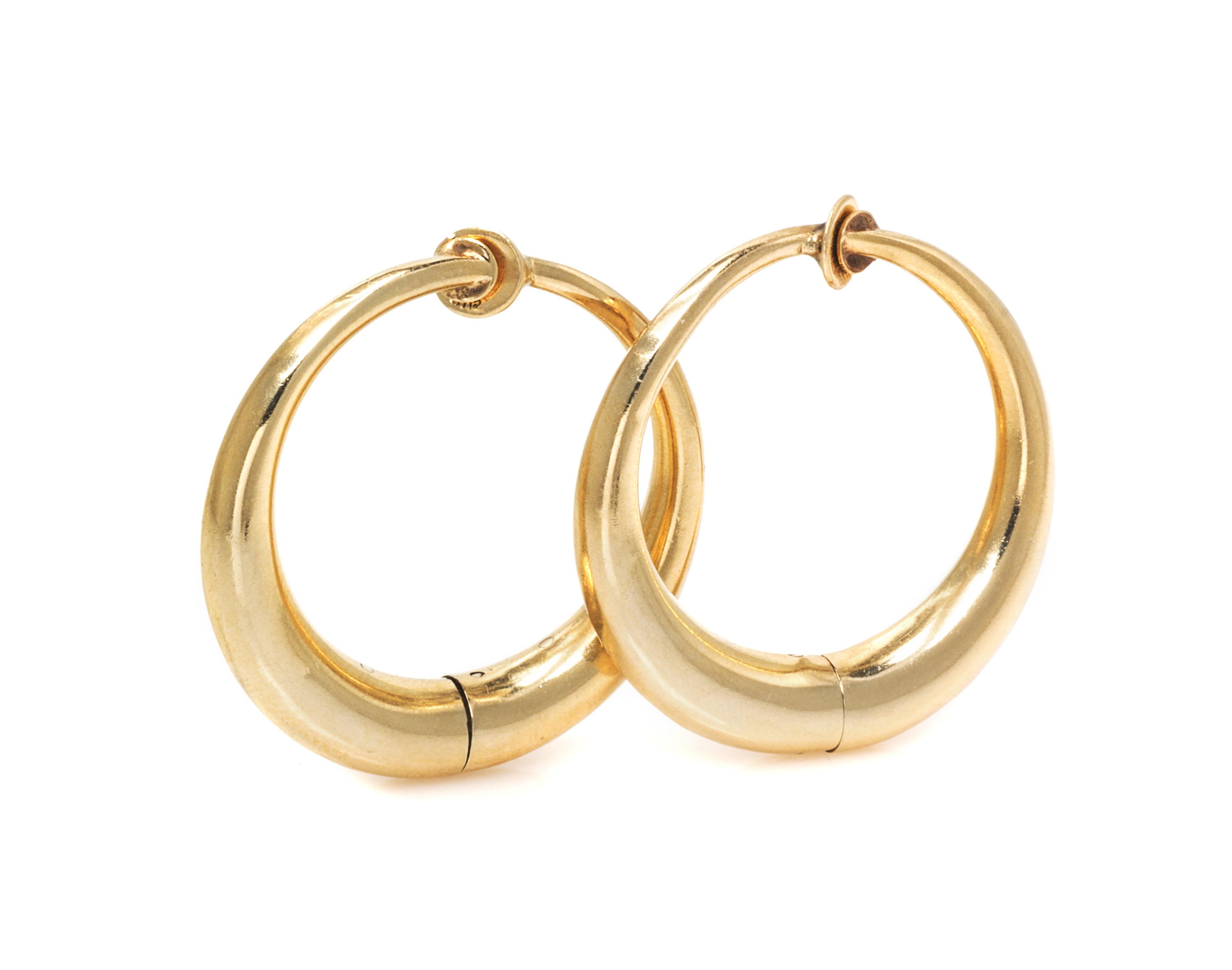 A Pair of 14 Yellow Gold Hoop Earclips, 4.80 dwts.