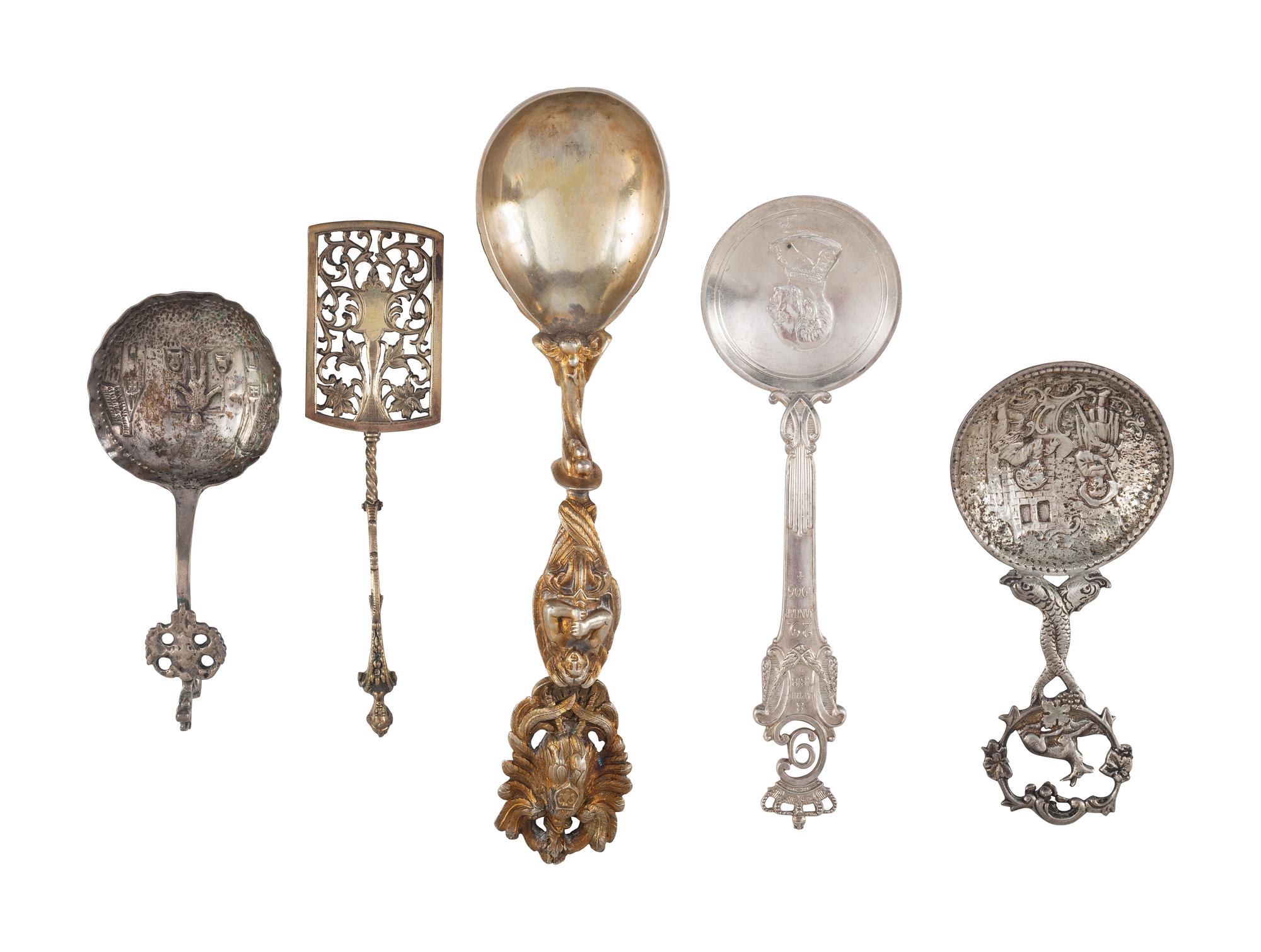 Twenty-Two Silver, Gilt and Enamel Souvenir and Serving Spoons and a Fork