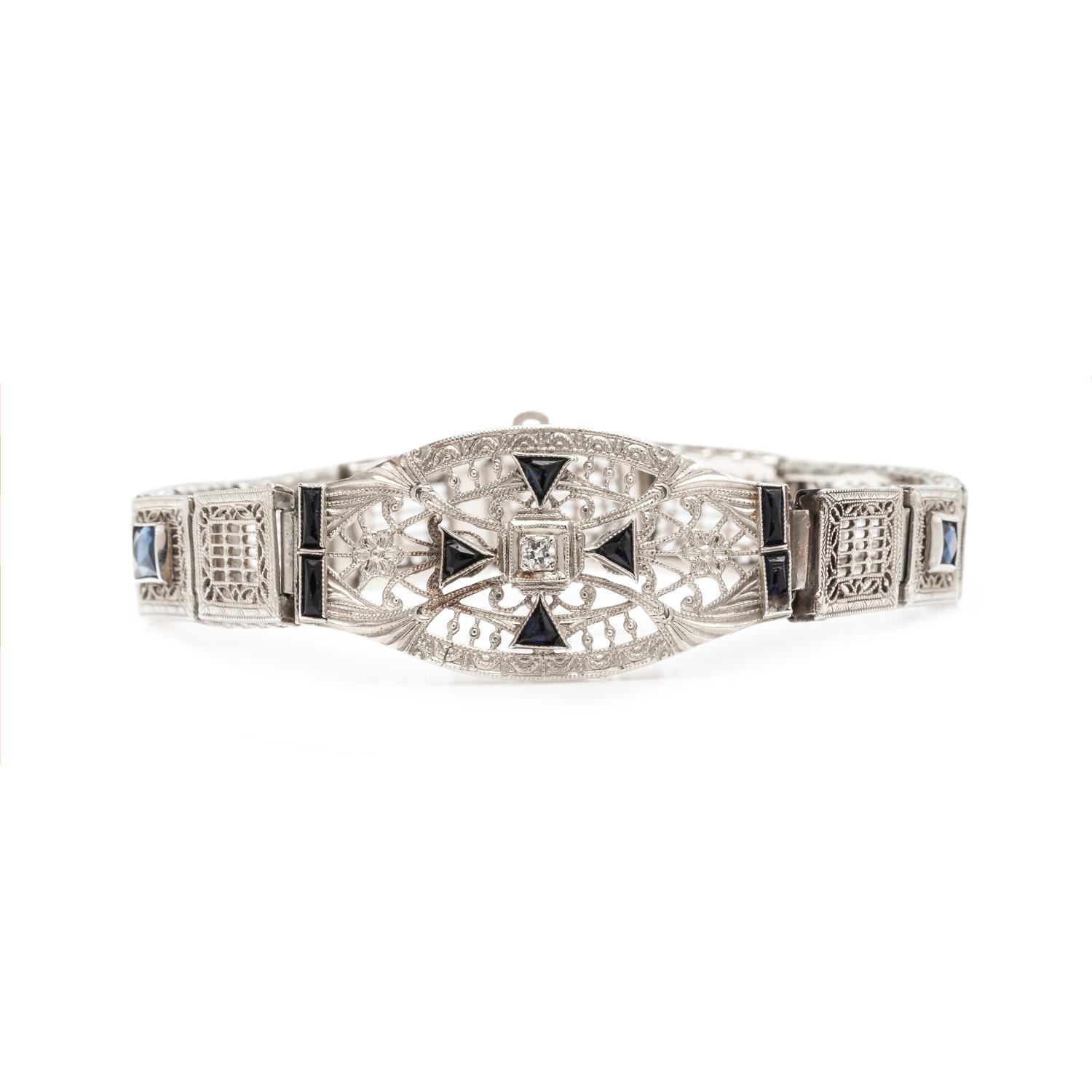 WHITE GOLD, DIAMOND AND BLUE GLASS BRACELET
