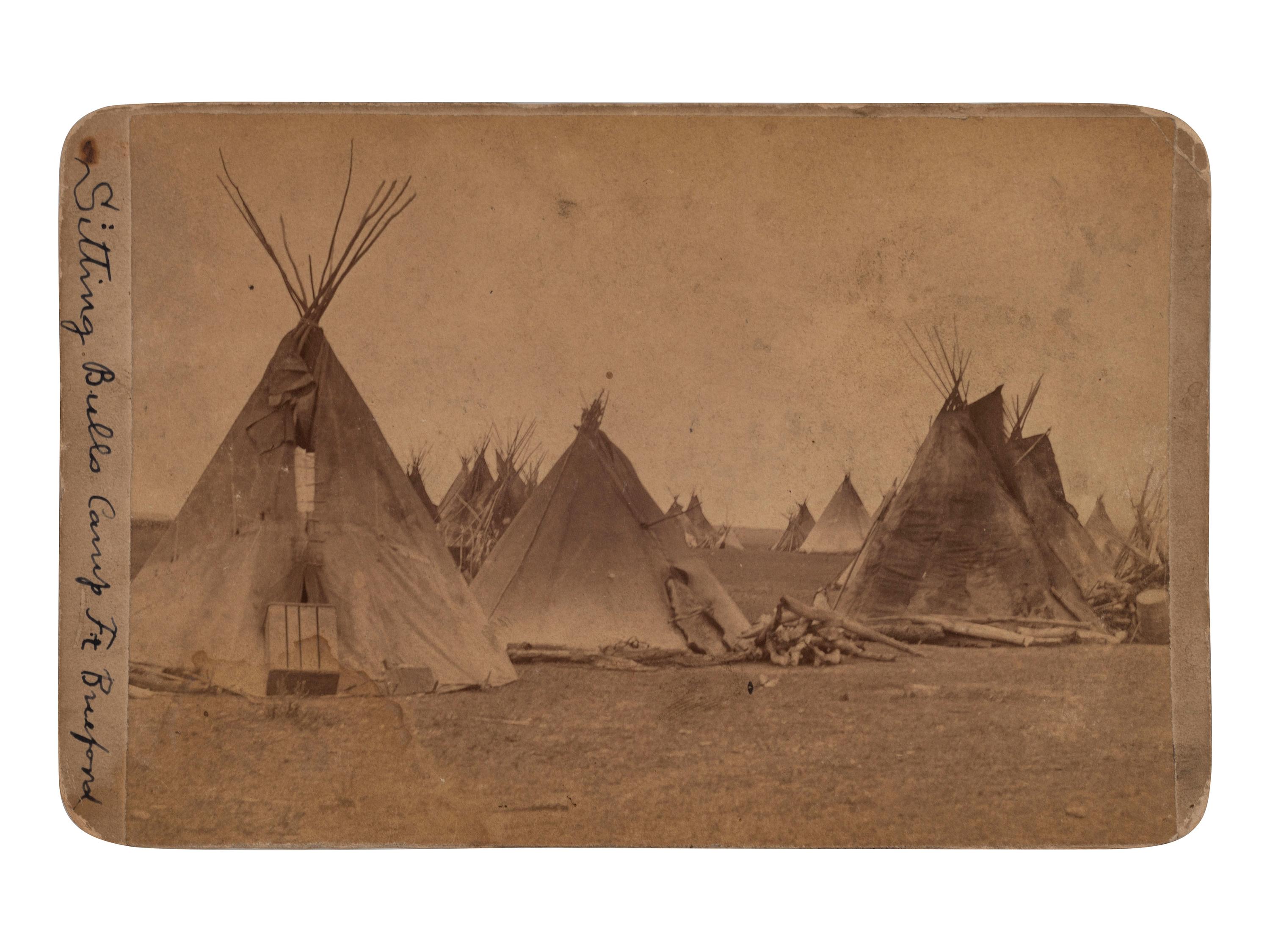 [NATIVE AMERICANS]. GOFF, O.S., photographer. A group of 2 cabinet cards of Sitting Bull and his camp. Bismarck, Dakota Territory.