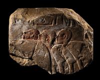 An Egyptian Painted Sandstone Relief Fragment
