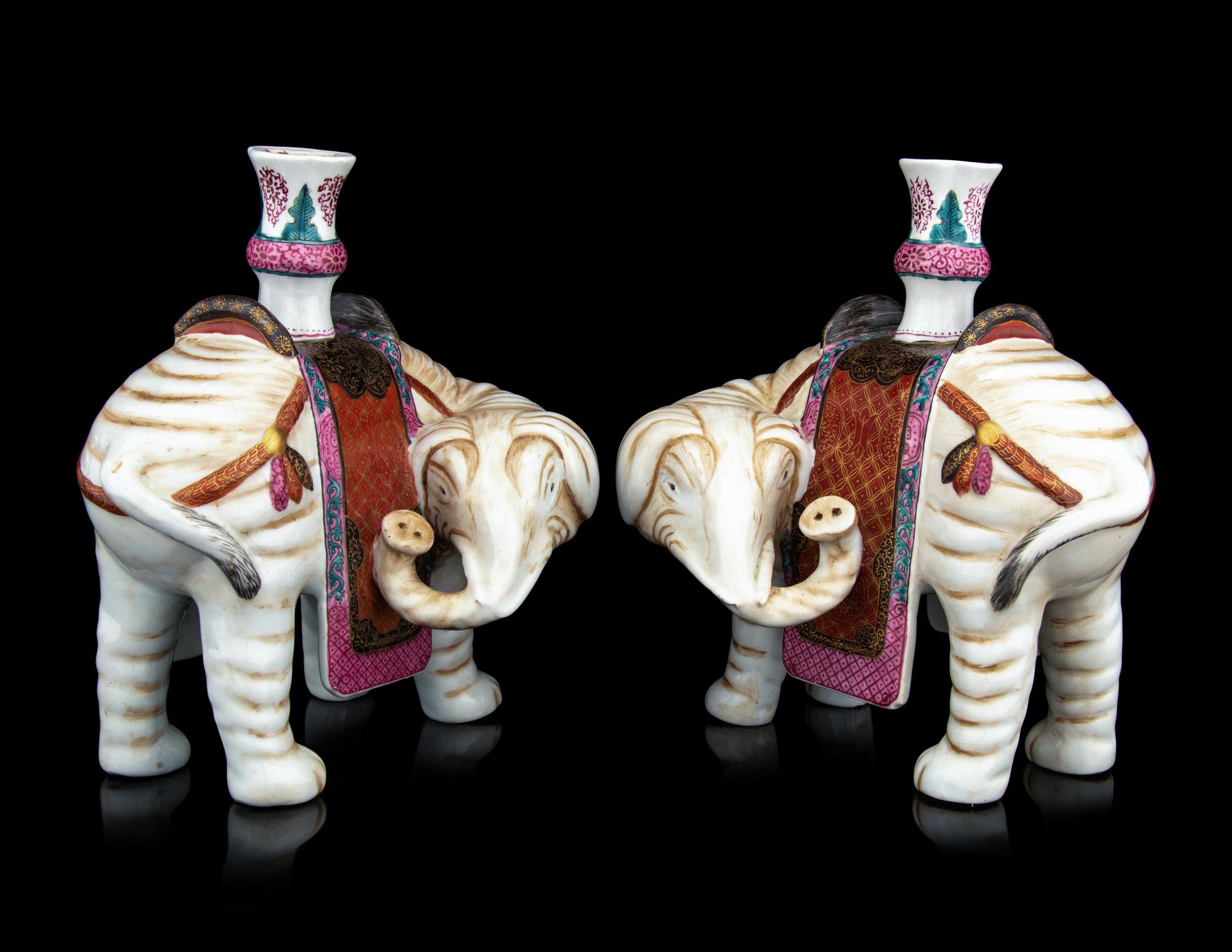 A Pair of Chinese Famille Rose Porcelain Elephant-Form Candle Holders