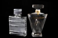 A Group of Two Guerlain Factice Perfume Bottles