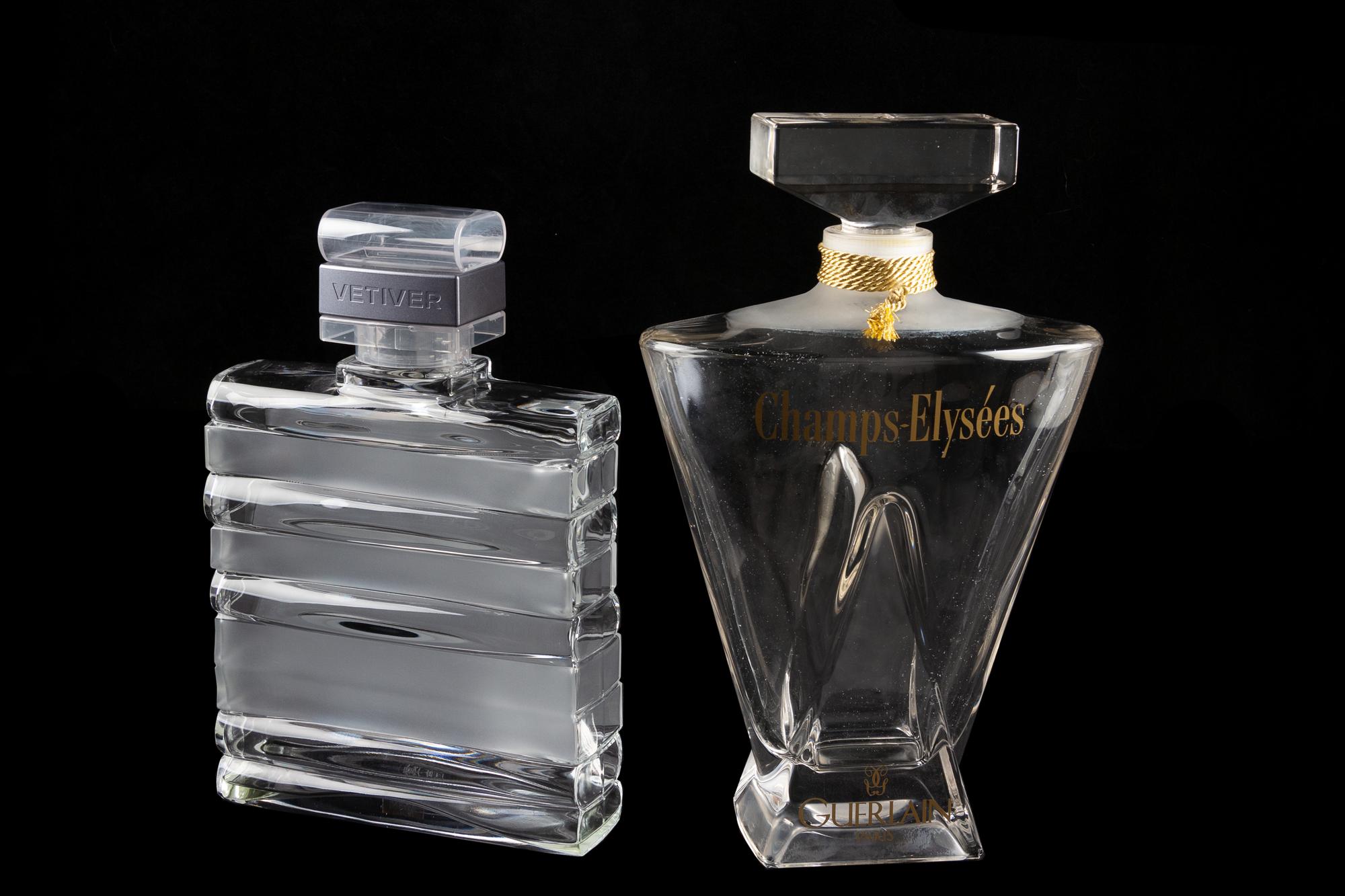 A Group of Two Guerlain Factice Perfume Bottles