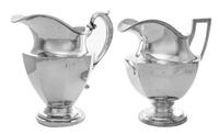 Two American Silver Water Pitchers, various makers, 20th Century, each of tapering paneled form, comprising an example marked Baltimore