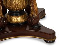 An Empire Style Inlaid Beechwood and Parcel Gilt Center Table by Hurtado