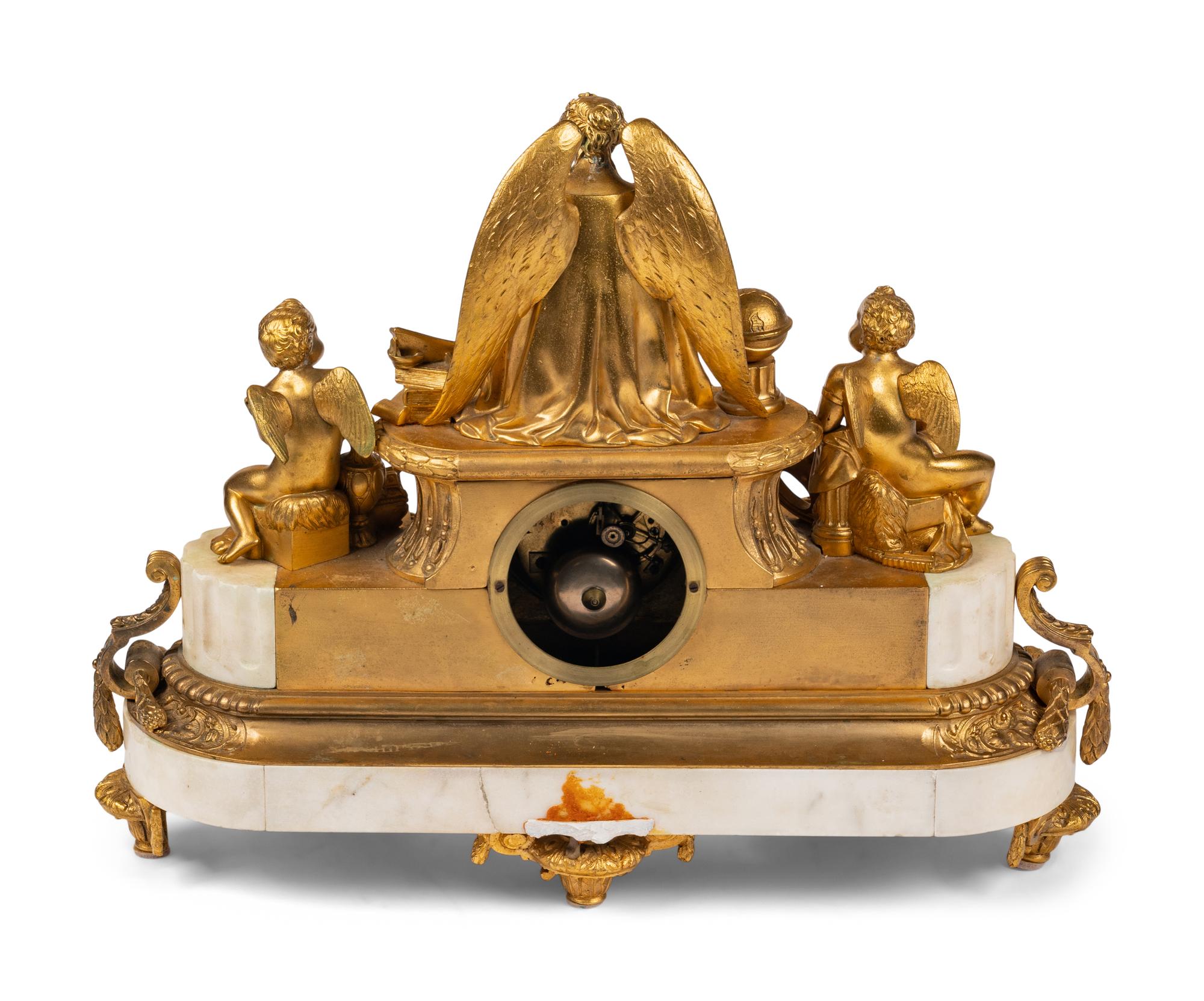 A French Gilt Bronze and Marble Mantel Clock