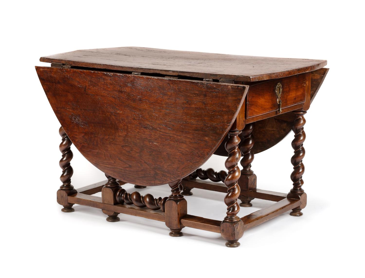 A William and Mary Walnut Drop-Leaf Table Height 30 1/2 x width 30 x depth 52 1/2 inches. — 18TH CENTURY