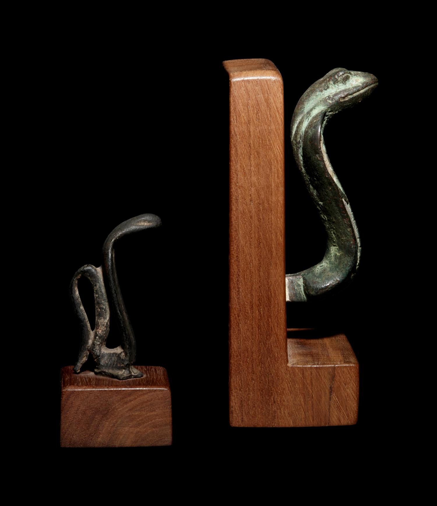 Two Egyptian Bronze Uraeus Finials