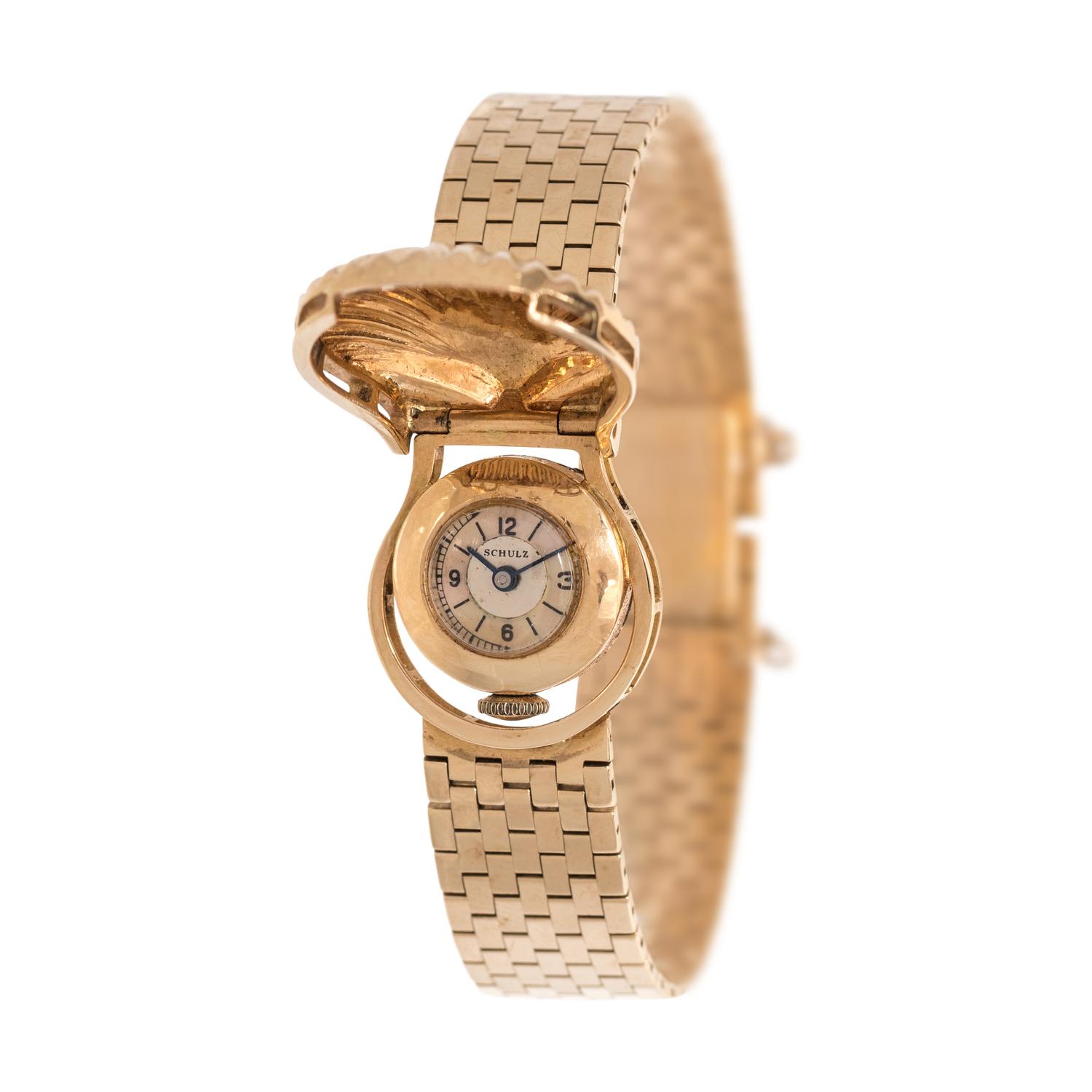 J. SCHULZ, 14K YELLOW GOLD SEASHELL SURPRISE WATCH