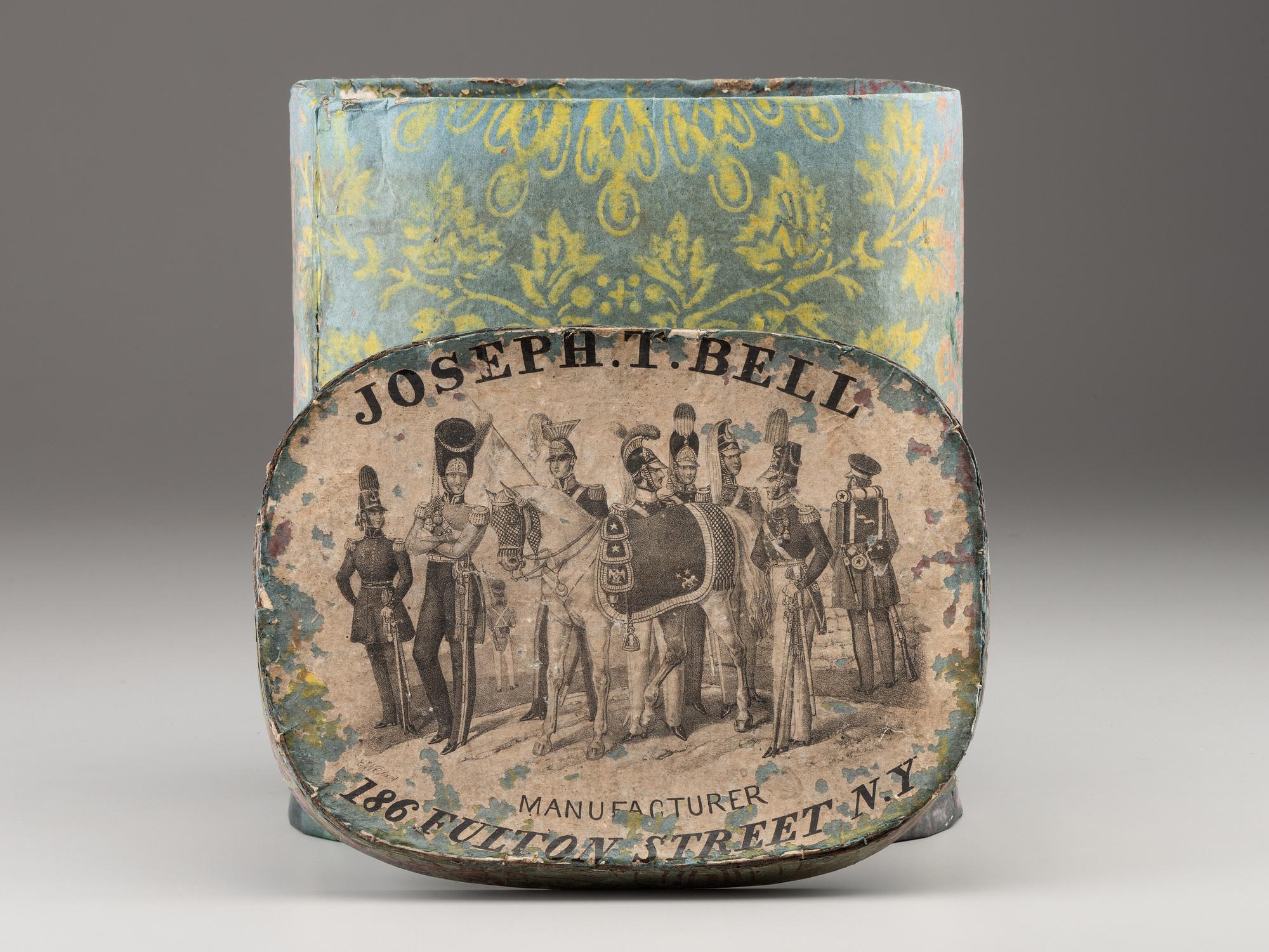[MILITIA]. Fully-trimmed militia dragoon shako with original box. Manufactured by Joseph T. Bell, New York, ca 1840.