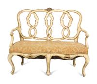 An Italian Painted and Parcel Gilt Settee with Fortuny Upholstery
