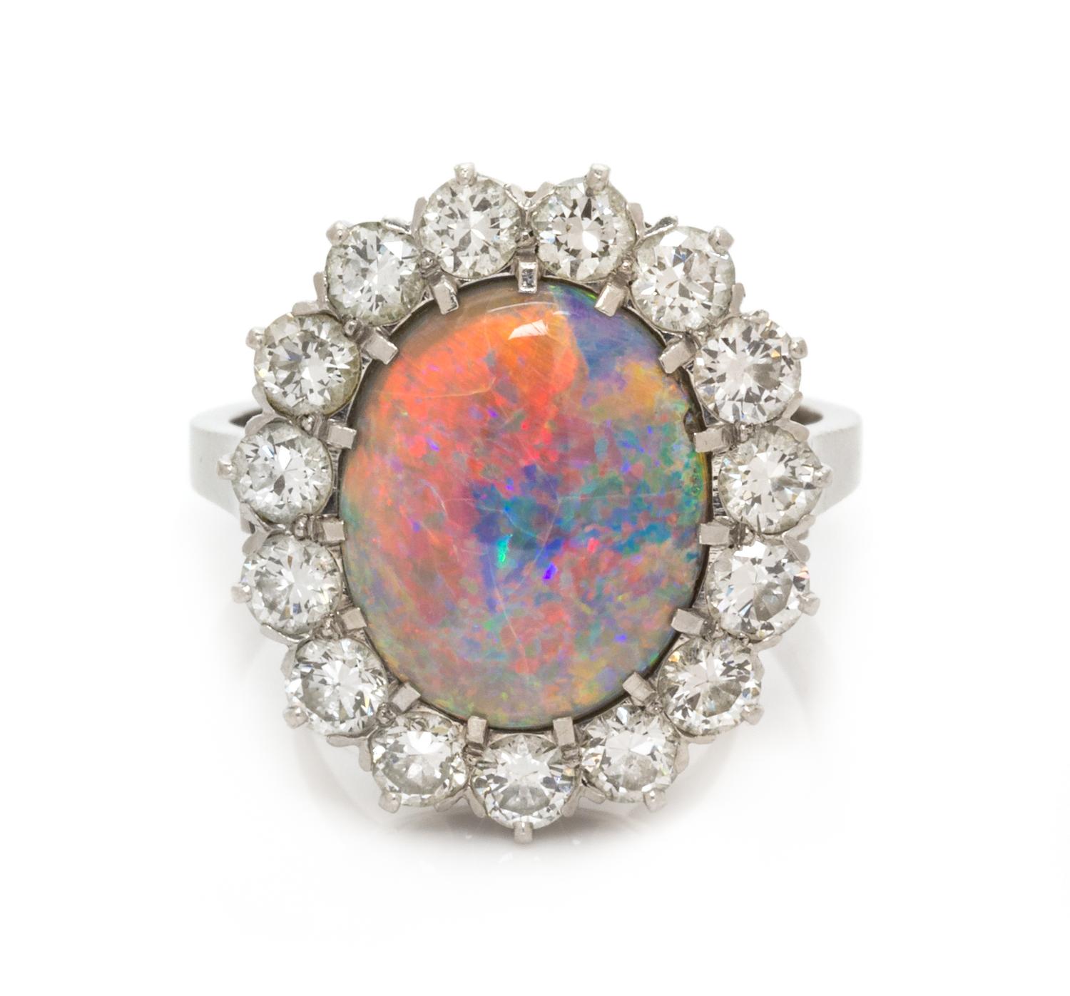 A Platinum, Opal and Diamond Ring, 5.85 dwts.