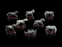 A Small Set of Eight Grey Jadeite Figures of Horses