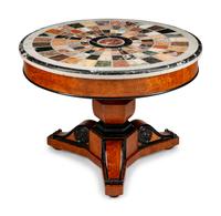 A Charles X Part Ebonized Cherrywood and Specimen Marble Center Table