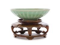 A Longquan Celadon Glazed Porcelain 'Lotus' Shallow Bowl Diameter 6 5/8 inches. — LIKELY SOUTHERN SOND DYNASTY, 13TH CENTURY