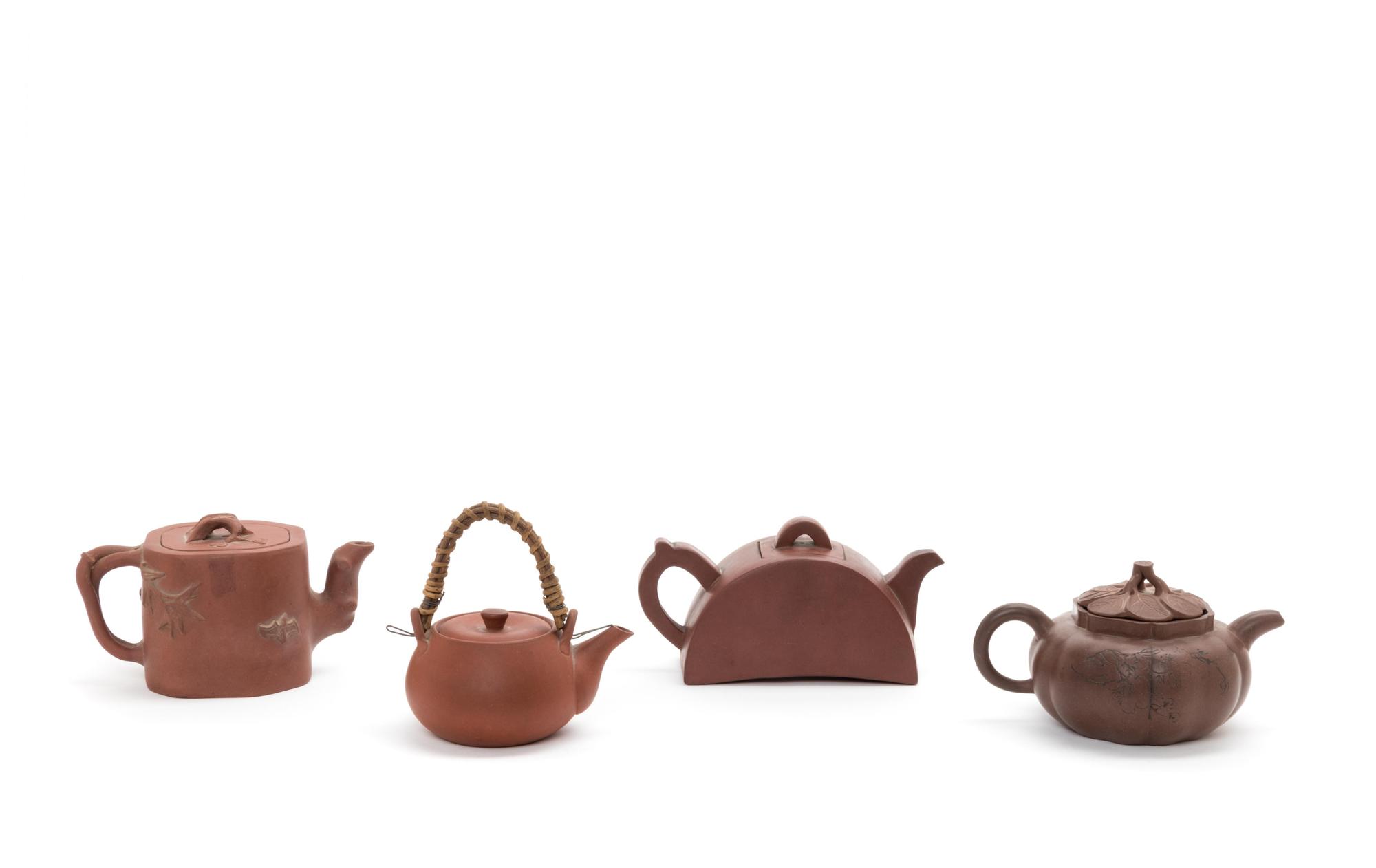 Four Chinese Yixing Pottery Teapots
