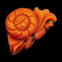 A Group of Chinese Red Carnelian and Coral Pendants