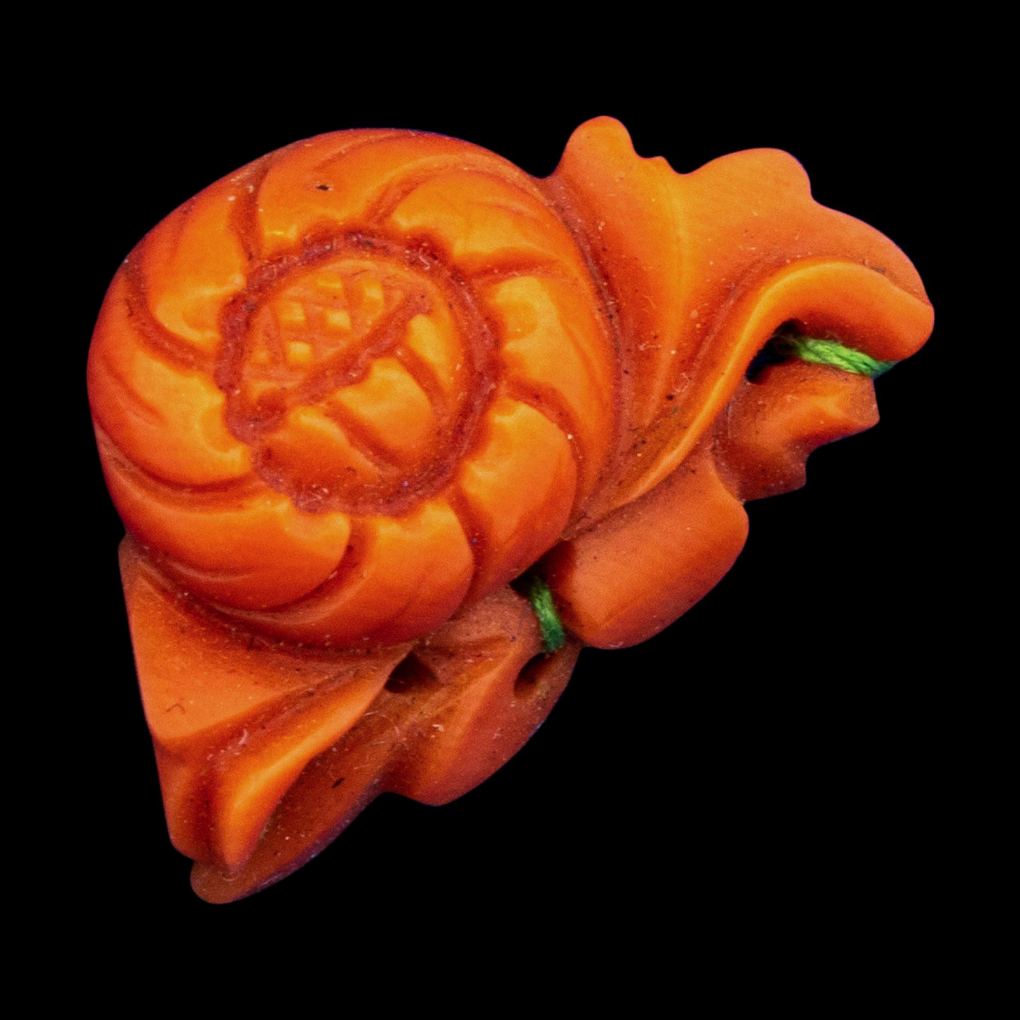 A Group of Chinese Red Carnelian and Coral Pendants