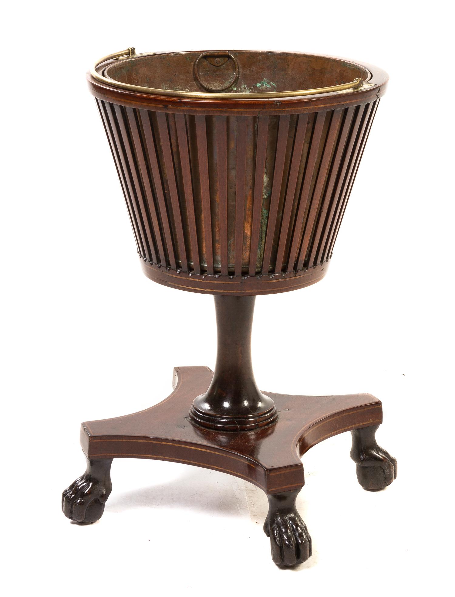A Regency Style Mahogany Jardiniere, Height 19 1/4 inches.