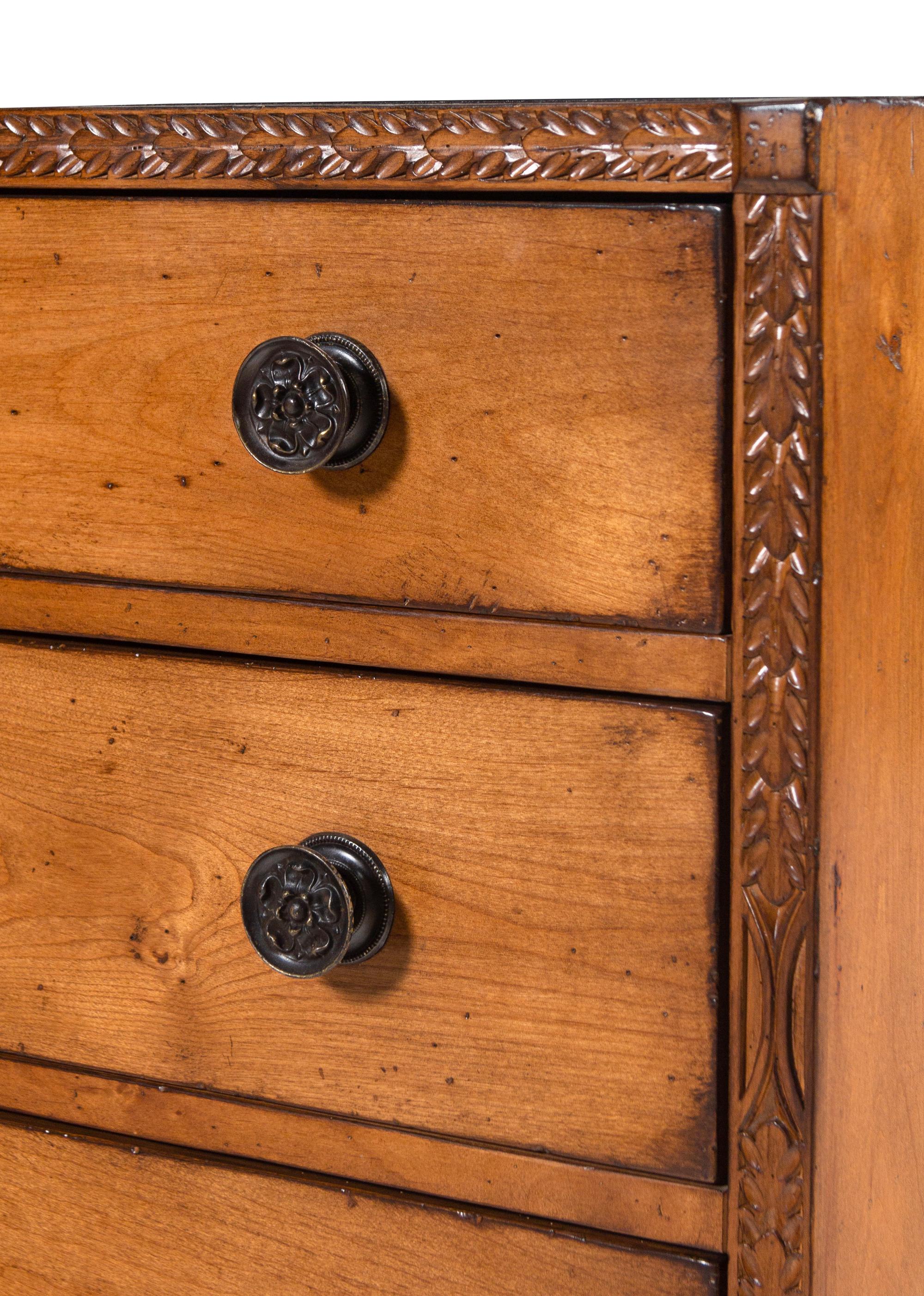 A Contemporary Carved Walnut Chest of Drawers