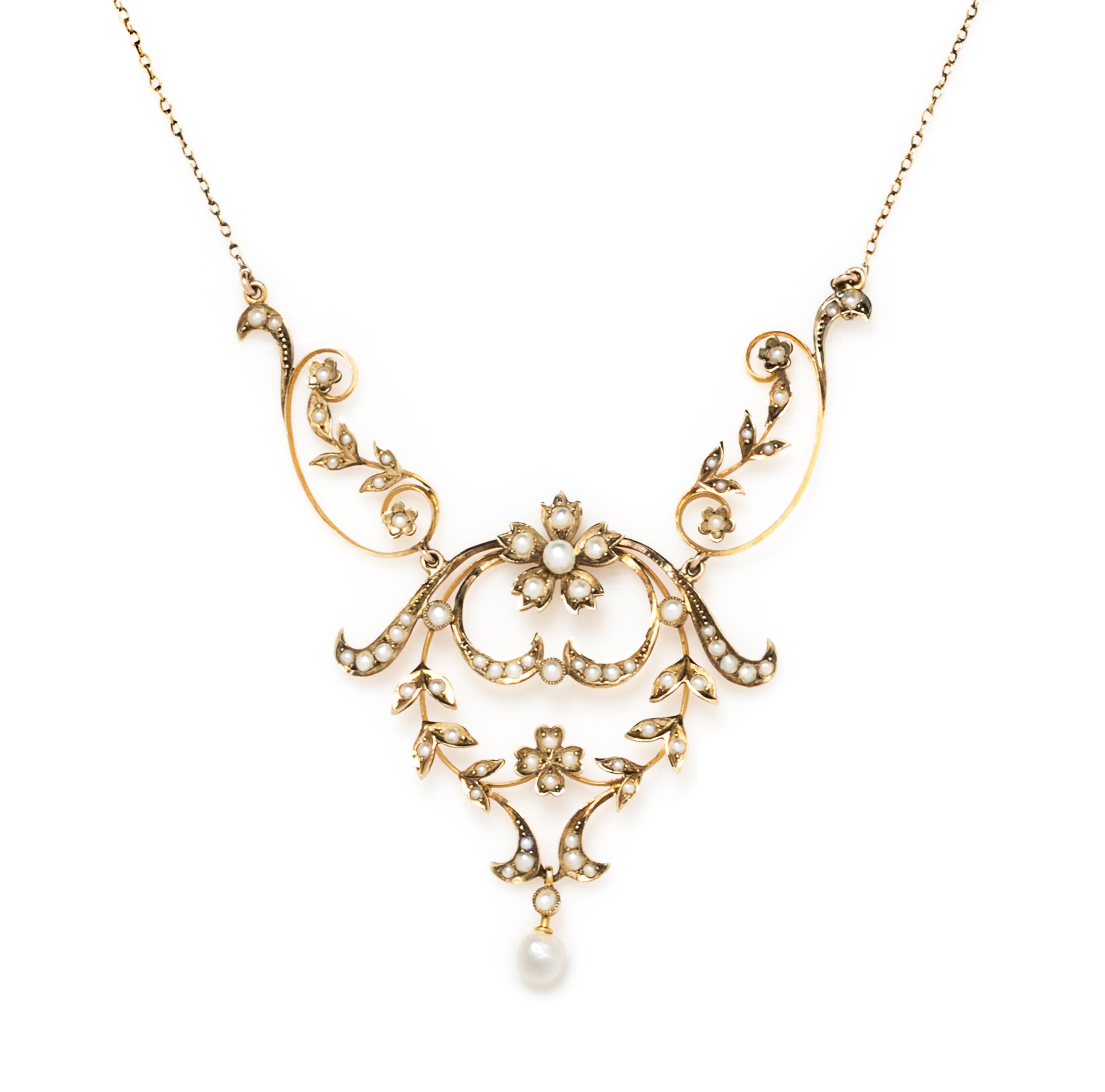 A 14 Karat Yellow Gold and Seed Pearl Necklace, 4.80 dwts.