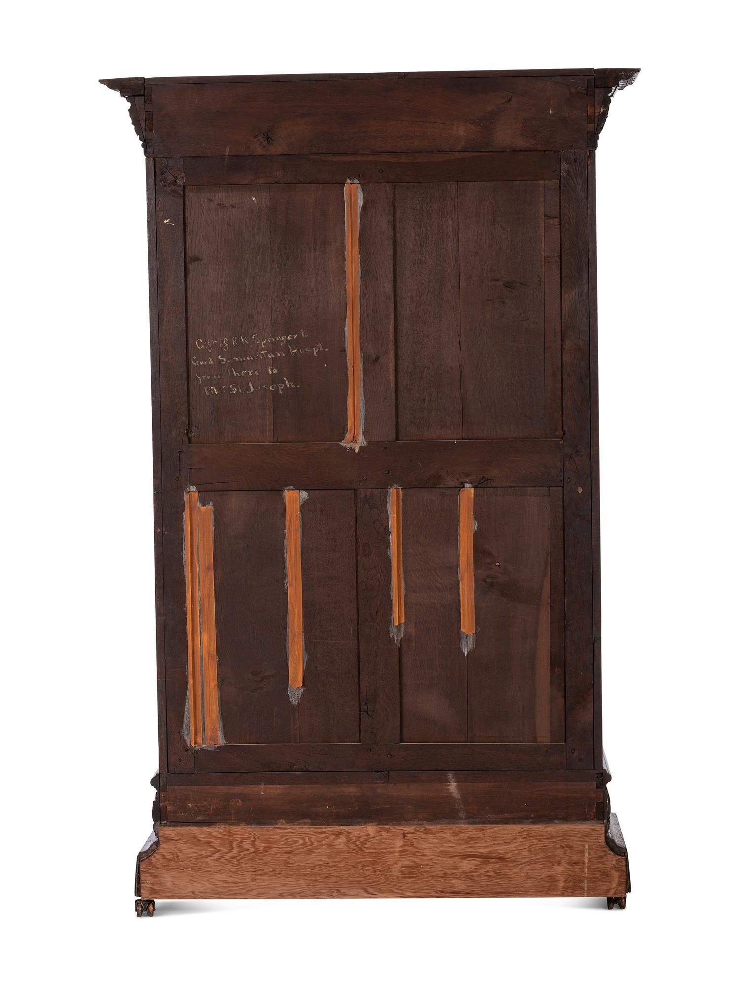 A Renaissance Revival Carved Oak Display Cabinet