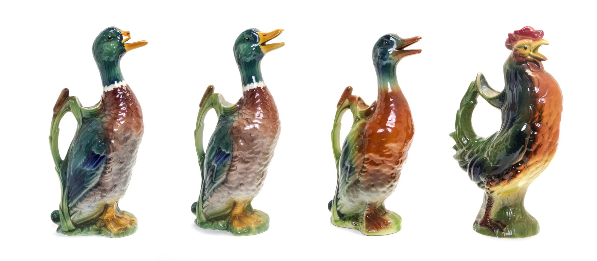 Four Majolica Zoomorphic Ewers Height of first 13 3/8 inches. — ST. CLEMENT MANUFACTURE, LATE 19TH CENTURY