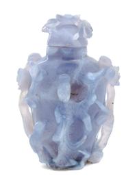 A Chinese Carved Agate Snuff Bottle Height 2 5/8 inches. — 20TH CENTURY
