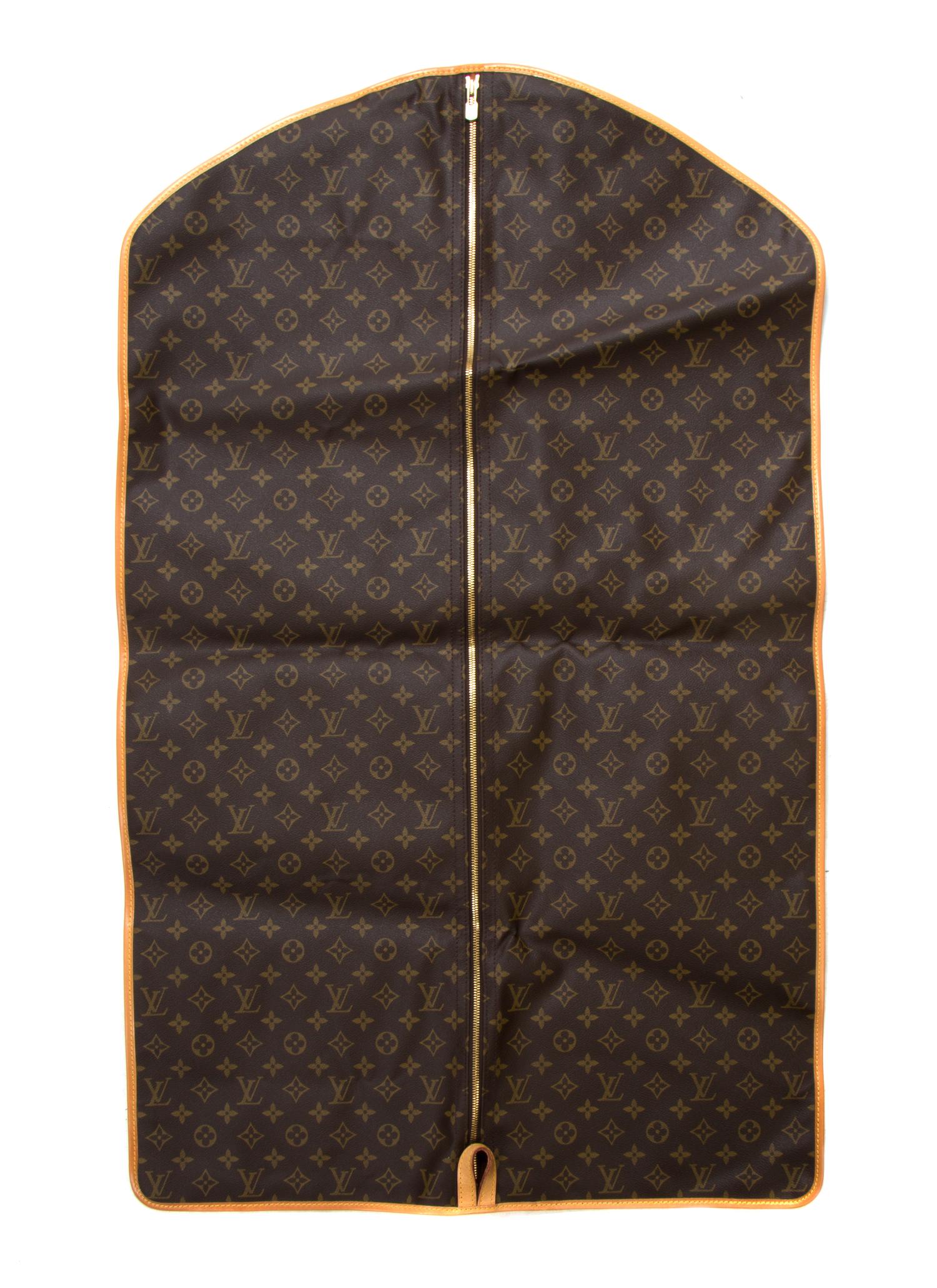 A Louis Vuitton Monogram Canvas Keepall 45 Bag and Garment Bag, 18 x 9 x 8 inches.
