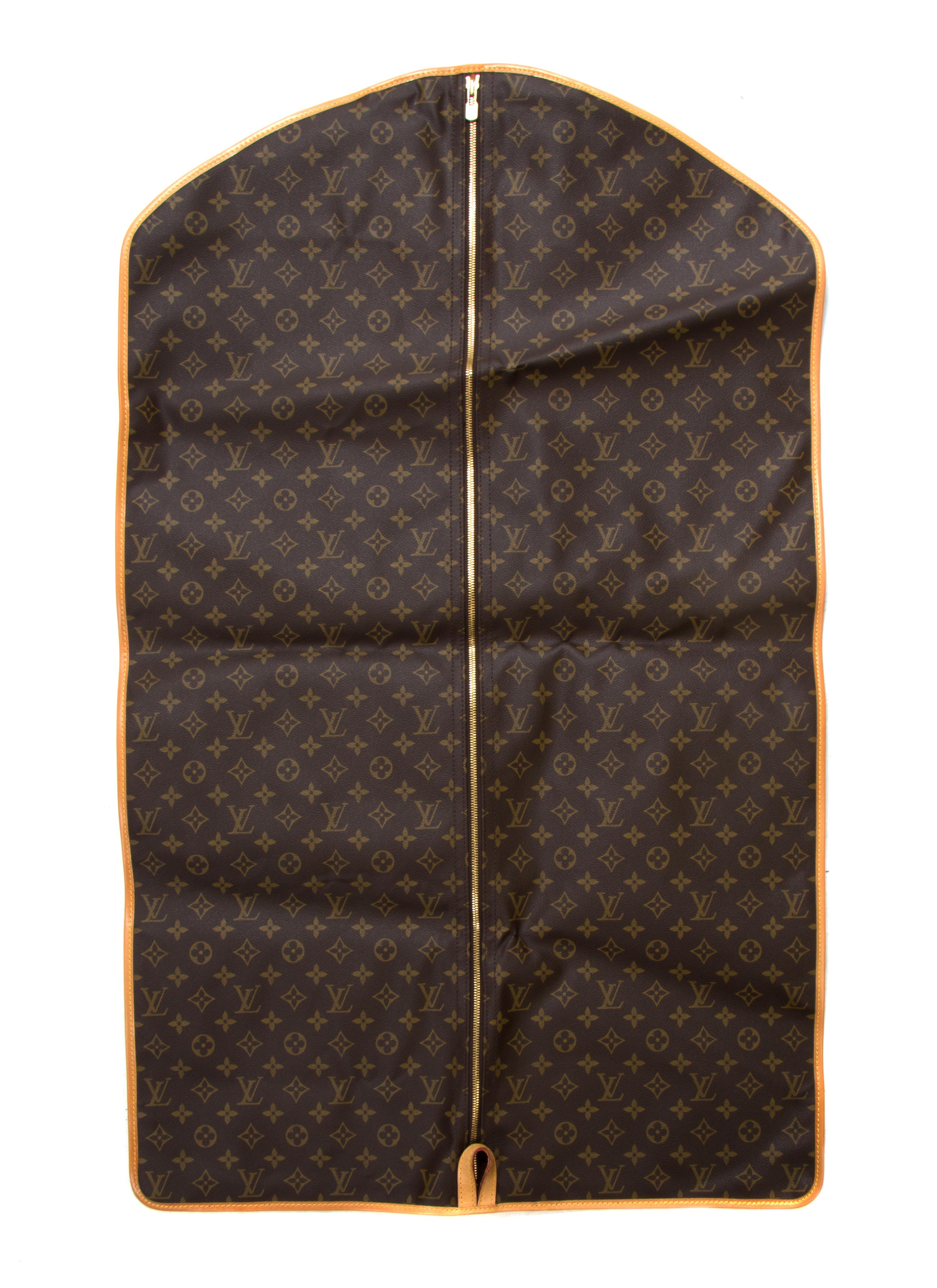 A Louis Vuitton Monogram Canvas Keepall 45 Bag and Garment Bag, 18 x 9 x 8 inches.