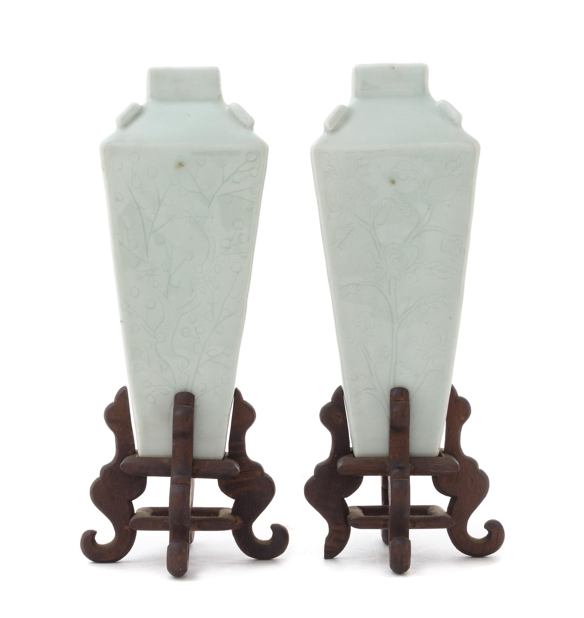 A Pair of Celadon Glazed Porcelain Vases Height of each 6 1/4 inches.