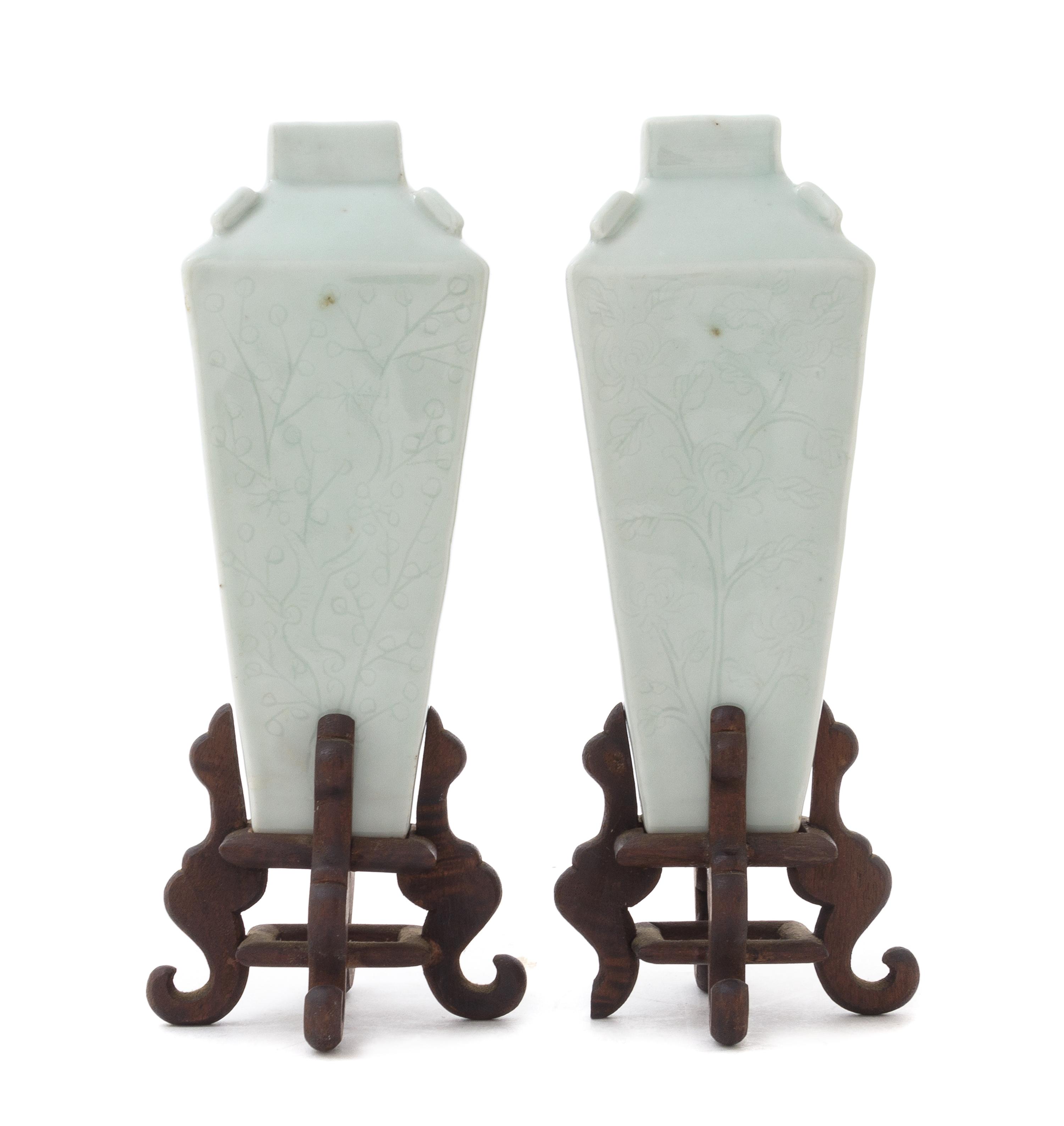 A Pair of Celadon Glazed Porcelain Vases Height of each 6 1/4 inches.