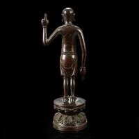 A Chinese bronze figure of the infant Buddha Ming dynasty