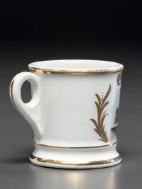 An Automobile Mechanic's Porcelain Occupational Shaving Mug