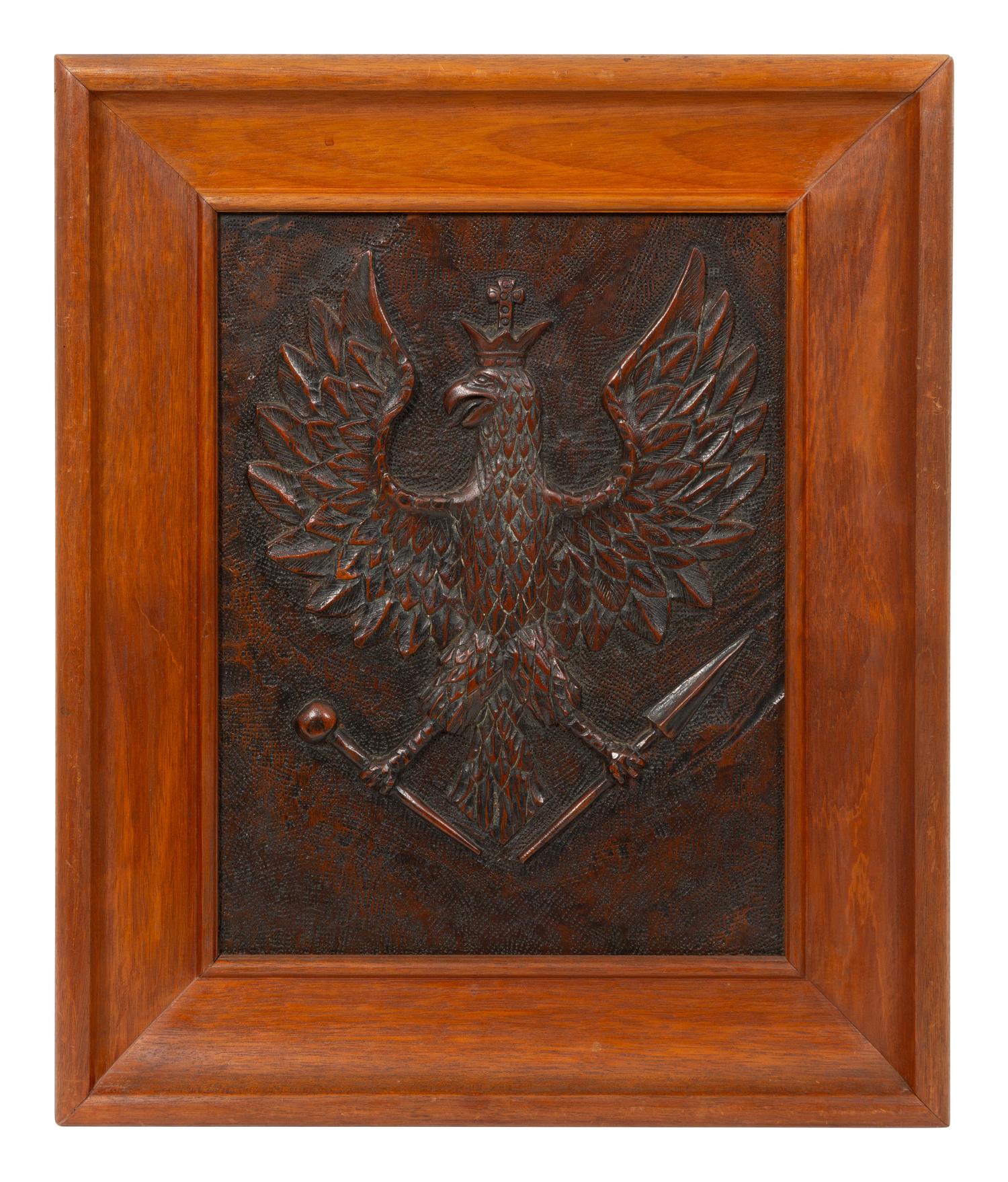 A Continental Carved Wood Panel of Spread Winged Crowned Eagle
