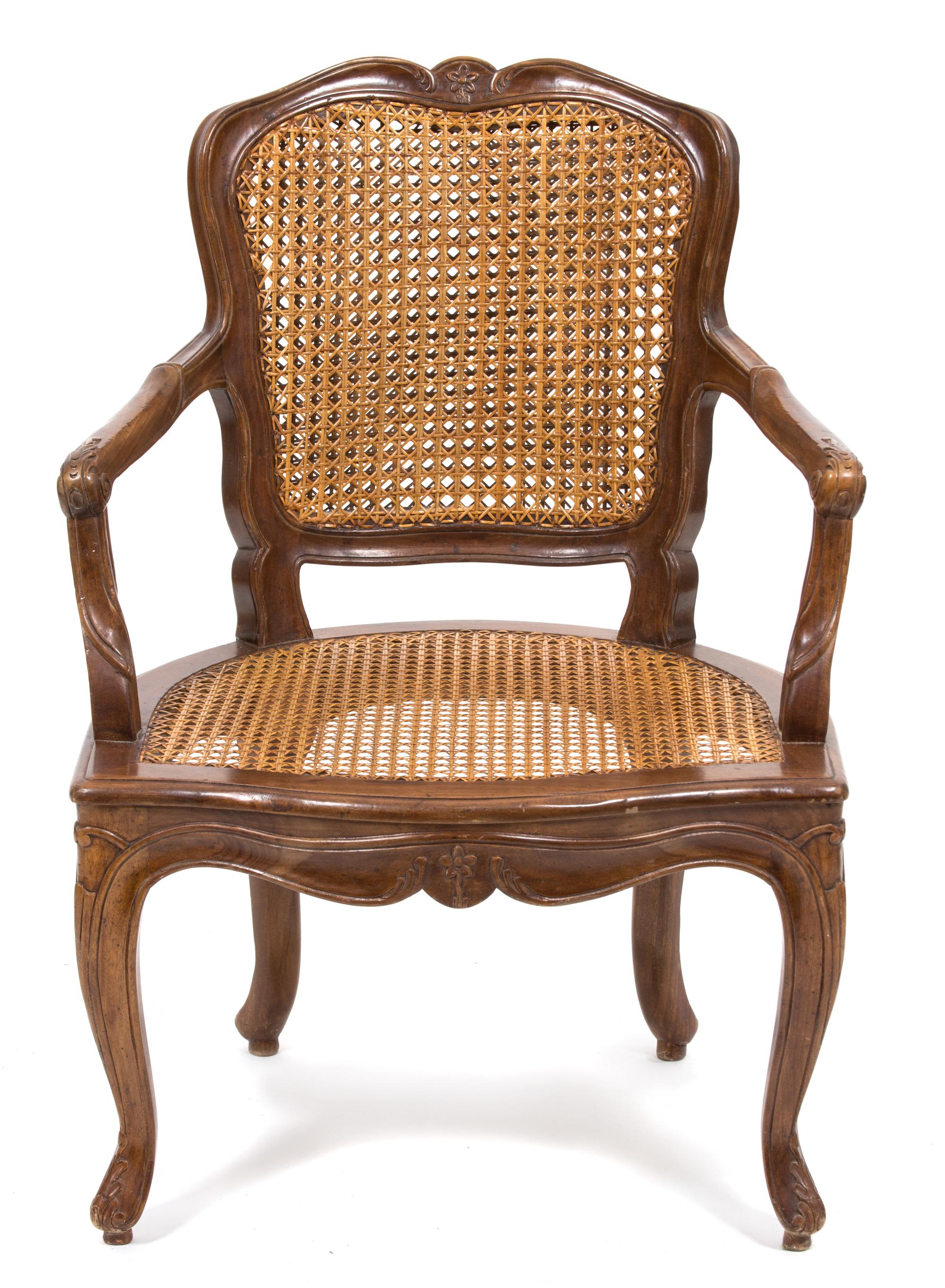 A Louis XV Style Walnut Fauteuil Height 33 x width 23 1/2 x depth 23 inches. — 20TH CENTURY