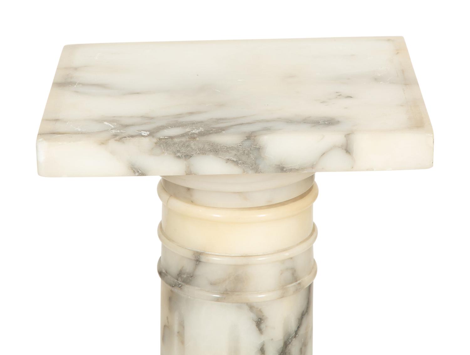 A Carved Alabaster Pedestal