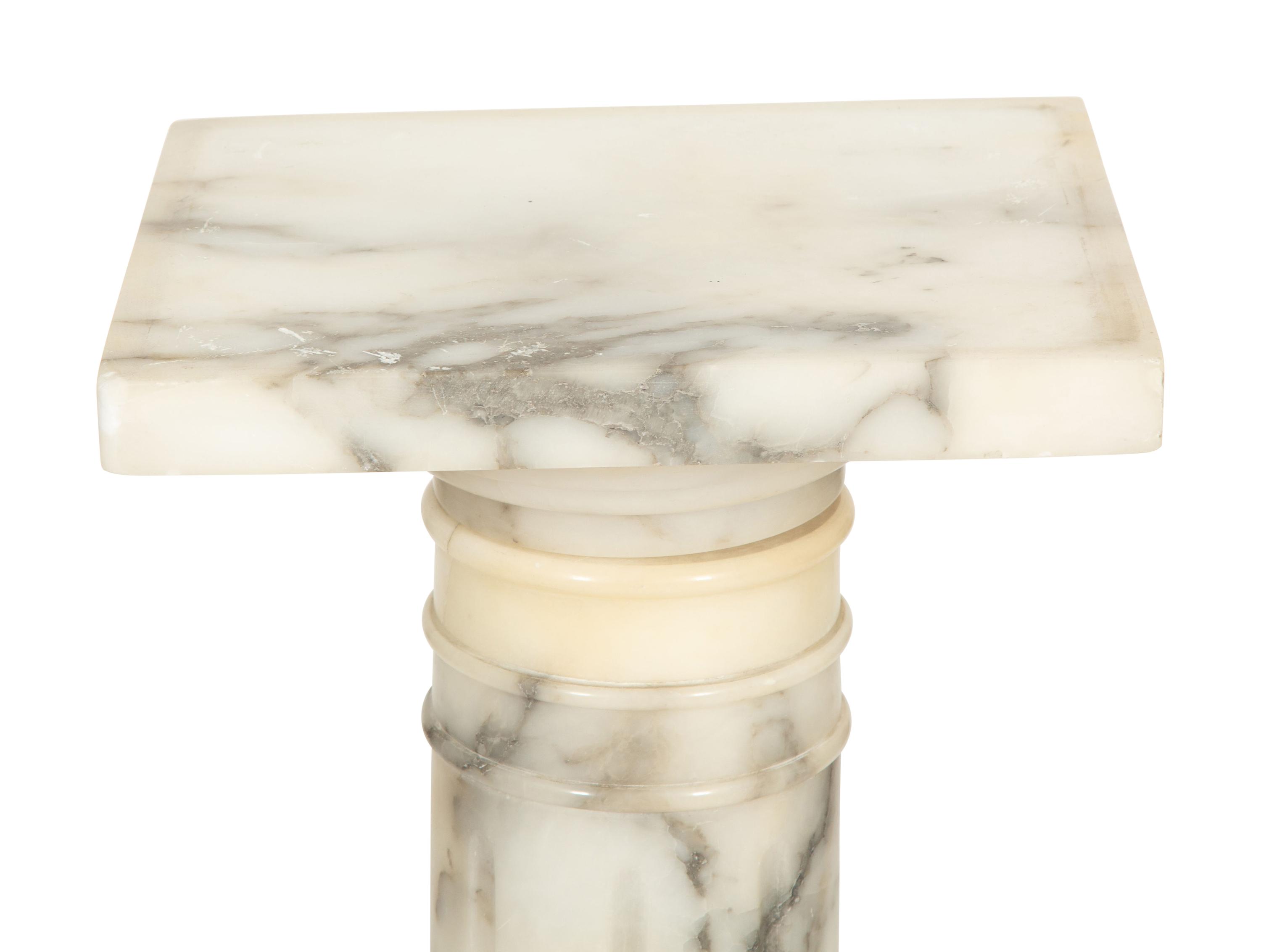 A Carved Alabaster Pedestal