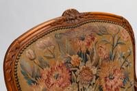 A Set of Four Louis XV Beechwood Fauteuils with Tapestry Upholstery