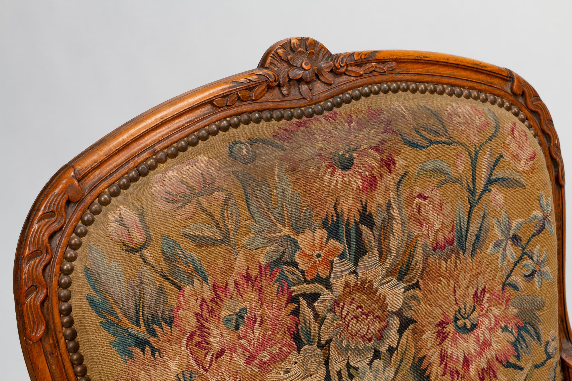A Set of Four Louis XV Beechwood Fauteuils with Tapestry Upholstery