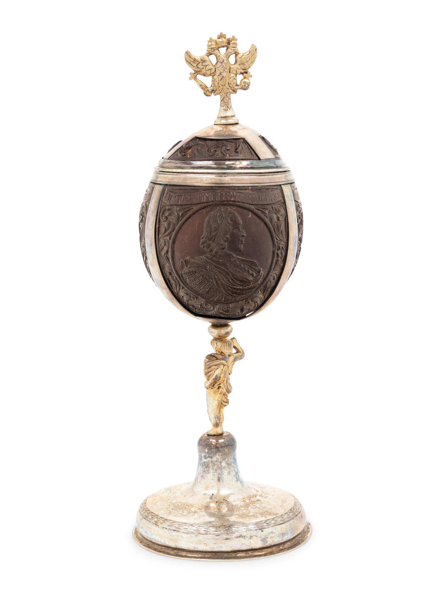 A Silver-Gilt Mounted Carved Coconut Cup and Cover of Russian Interest