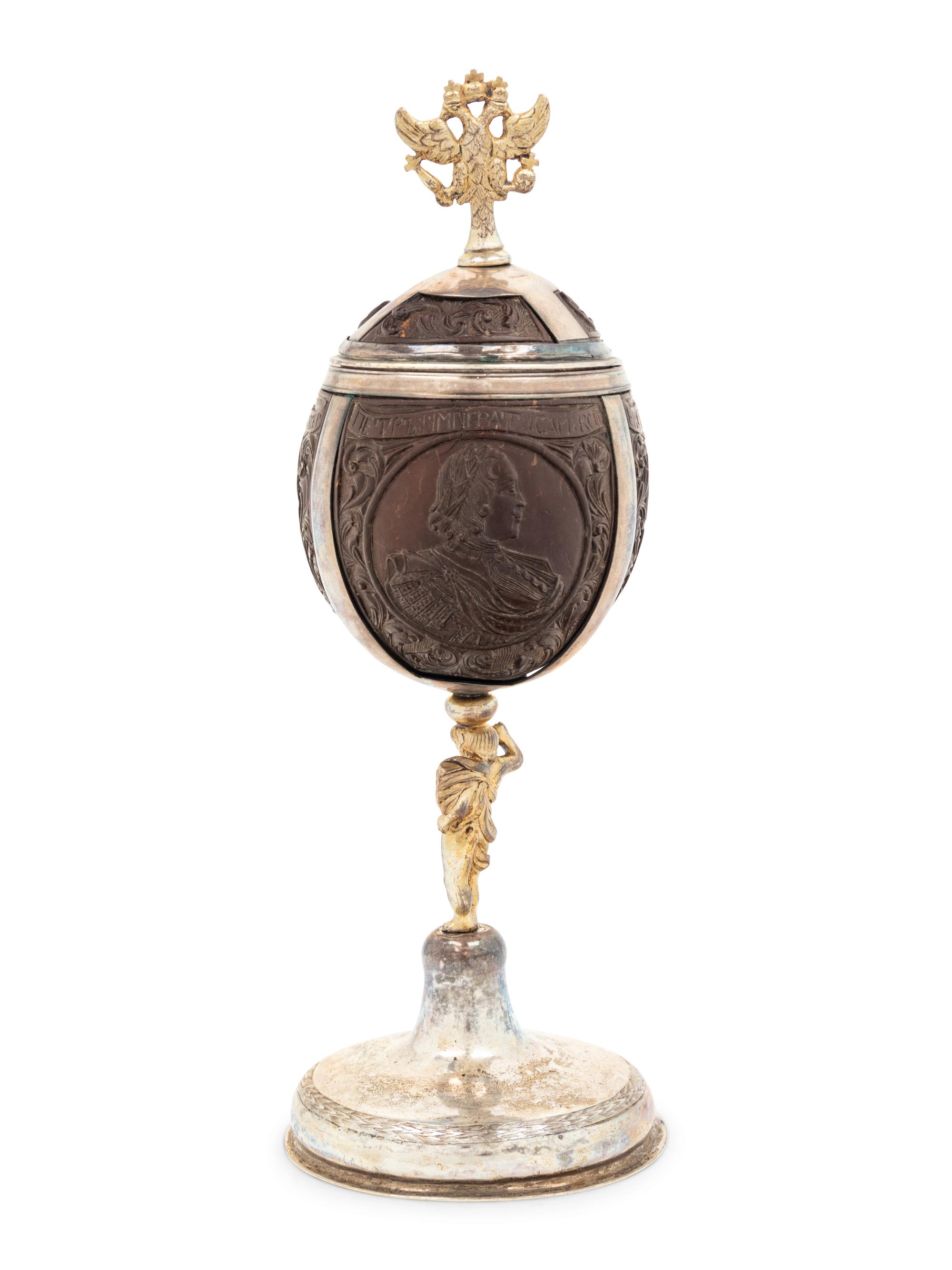 A Silver-Gilt Mounted Carved Coconut Cup and Cover of Russian Interest