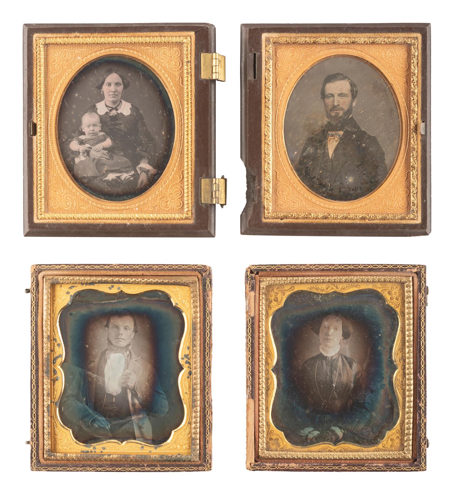 [EARLY PHOTOGRAPHY]. 28 daguerreotypes housed in pairs within side-by-side cases.