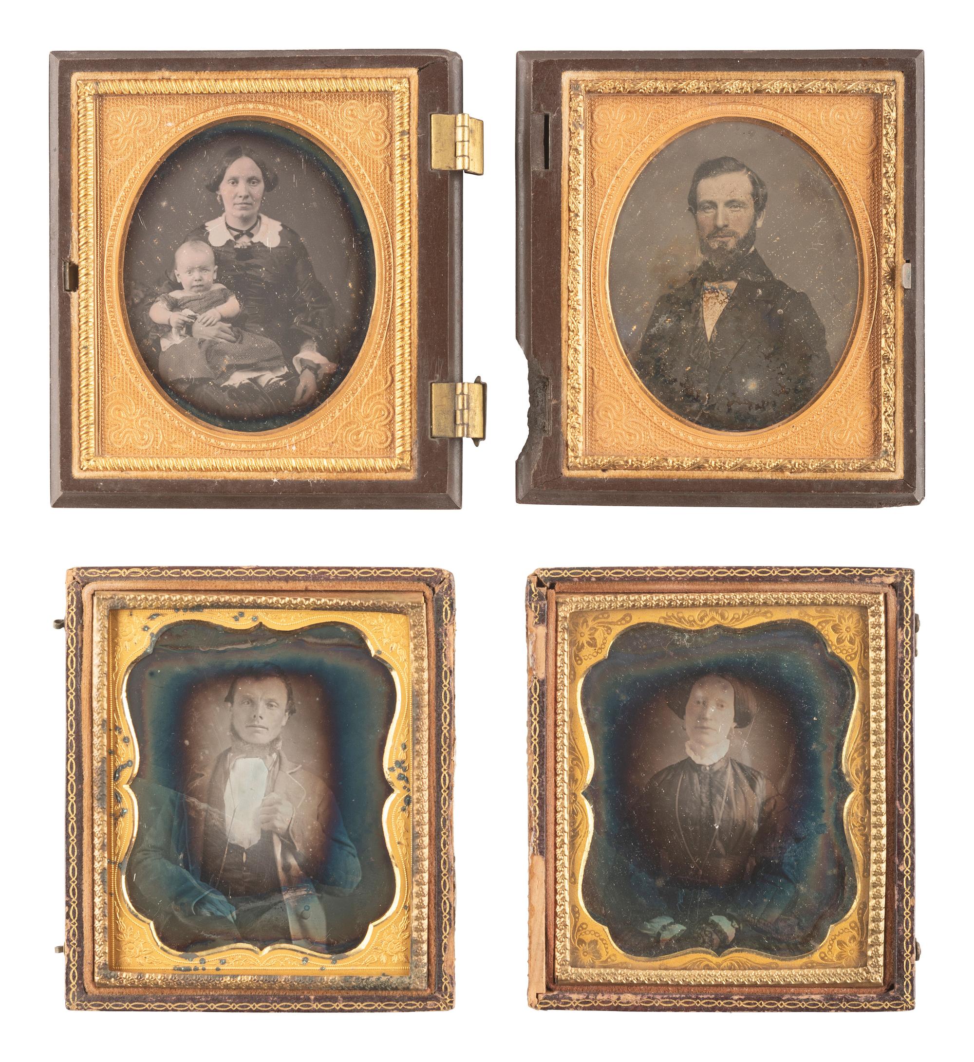 [EARLY PHOTOGRAPHY]. 28 daguerreotypes housed in pairs within side-by-side cases.