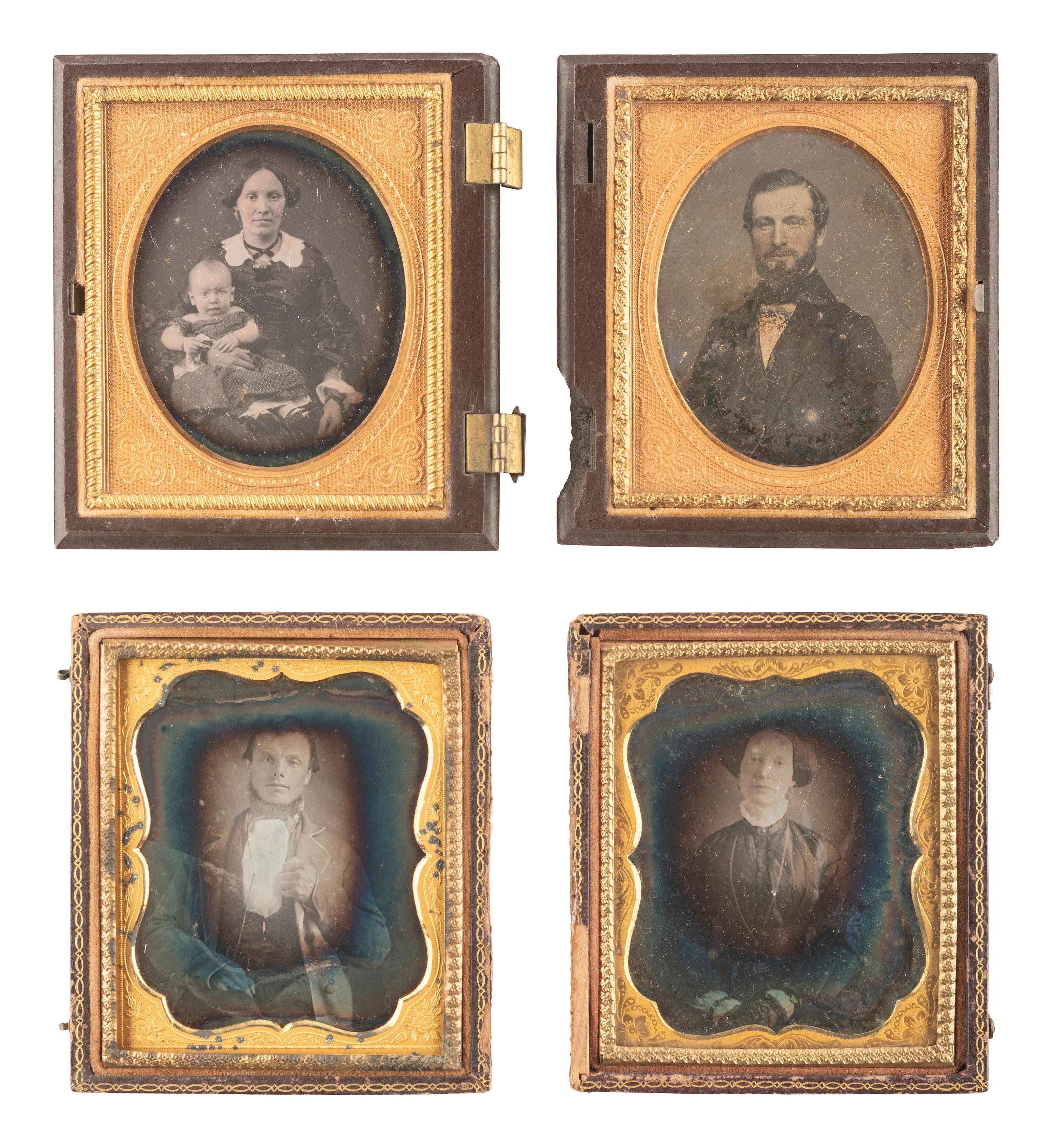 [EARLY PHOTOGRAPHY]. 28 daguerreotypes housed in pairs within side-by-side cases.
